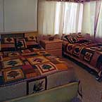 2nd bedroom with double bed and twin bed